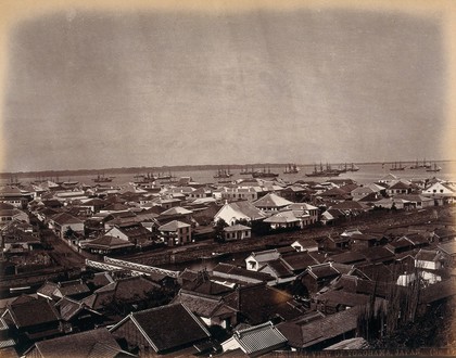 Yokohama, Japan: panoramic view of the native and European residences in Yokohama town, looking towards the harbour. Photograph by W.P. Floyd, ca. 1873.