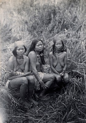 Sarawak: three Kayan women of the Upper Rejang region. Photograph.