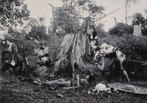 view Sarawak: five Kenyah warriors in a warfare ritual. Photograph.