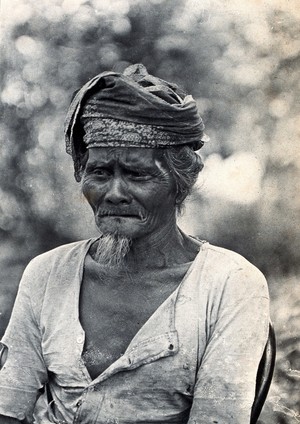 view Sarawak: a Land Dayak chief. Photograph.