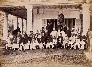 view Malaya: Chinese merchants grouped outside their club house on Penang Island. Photograph by J. Taylor, 1881.