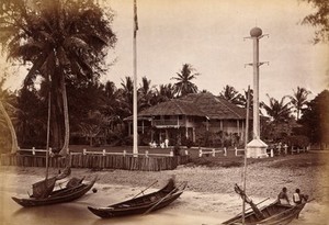 view Malaya: a magistrate's house located by a Malay beach. Photograph by J. Taylor, 1881.