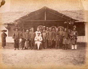 view Malaya: Captain China surrounded by his Chinese and Malay followers. Photograph by J. Taylor, 1880.