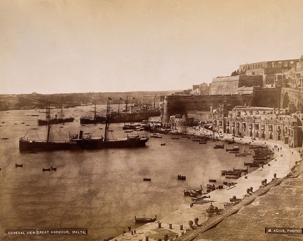 Malta: view of Grand Harbour and buildings along Barriera wharf towards Fort Lascaris and Upper Barrakka. Photograph by H. Agius, c. 1881.