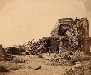 view India: a ruined observatory and battery with distant view of Hindoo Rao's house. Photograph by F. Beato.