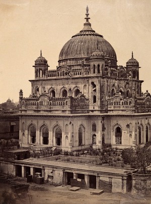view Lucknow, India: the tomb of Shahadut Allee in the Kaiser Bagh palace, showing damage done during the Indian Rebellion. Photograph by Felice Beato, ca. 1858.