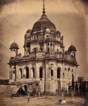 view Lucknow, India: the tomb of Khursheed Zadi in the Kaiser Bagh Palace complex, showing damage done during the Indian Rebellion of 1858. Photograph by Felice Beato, ca. 1858.