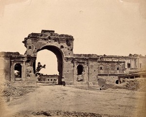 view Lucknow, India: gateway of the Lucknow Residency, showing damage caused during the Indian Rebellion. Photograph by Felice Beato, ca. 1858.