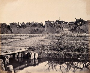 view Taku, China: entrance to the North Fort on the Peiho River during the Second China War. Photograph by Felice Beato, 1860.