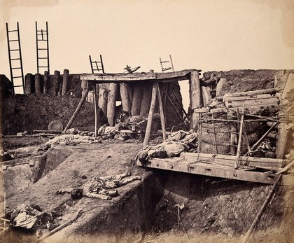 Taku, China: the North Fort: Chinese corpses following the capture of the fort by the English and French armies on August 21st 1860, during the Second China War. Photograph by Felice Beato, 1860.