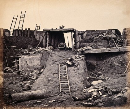 Taku, China: the North Fort: Chinese corpses on the day of the fort's capture by the English and French armies during the Second China War. Photograph by Felice Beato, 1860.