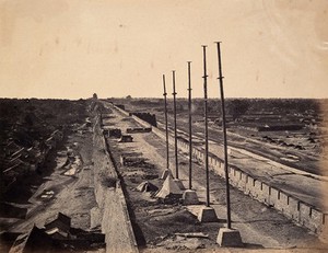 view Beijing, China: walls running from the Anting Gate, after capture by the English and French armies during the Second China War. Photograph by Felice Beato, 1860.