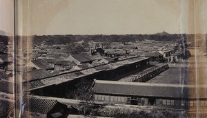 view Beijing, China: buildings at the entrance to the Chinese quarter of the city (?): panoramic view: section one. Photograph by Felice Beato, 1860.