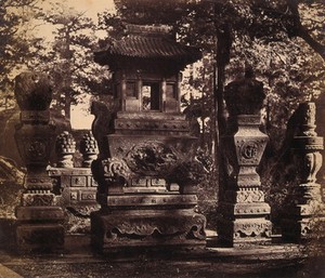 view Near Beijing, China: interior of a tomb showing ornate monuments. Photograph by Felice Beato, 1860.