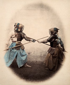 view Japan: spear-men wearing protective clothing and masks. Coloured photograph by Felice Beato, ca. 1868.