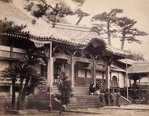 view Nagasaki, Japan: the Daion-ji Temple: priest with samurai and attendants. Photograph by Felice Beato, ca. 1868.