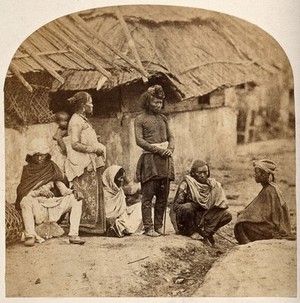 view Nepal: Sunwar people outside a dwelling. Photograph by Clarence Comyn Taylor, ca. 1860.