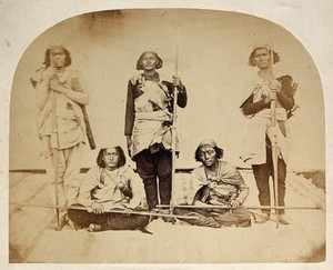 view Nepal: people bearing sticks: group portrait. Photograph by Clarence Comyn Taylor, ca. 1860.