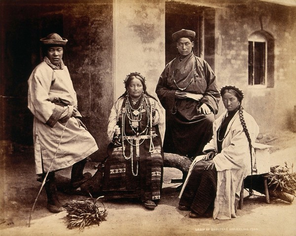 Darjeeling, India: women and men in traditional dress. Photograph, 1904.