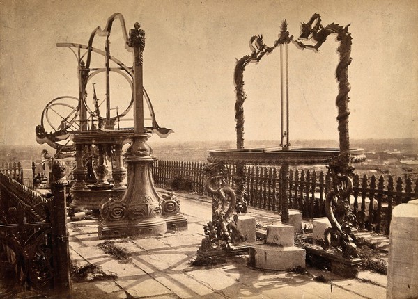 Jesuit observatory, Beijing, China: bronze astronomical instruments displayed on decorative stands. Photograph, ca. 1860.