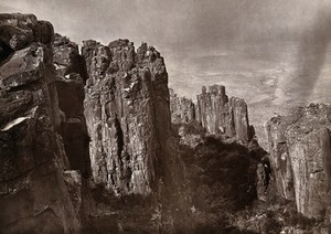 view Valley of Desolation, South Africa: rock formations overlooking a valley. Woodburytype, 1888, after a photograph by Robert Harris.