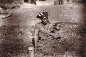 view Cape Colony, South Africa: an African woman and child. Woodburytype, 1888, after a photograph by Robert Harris.