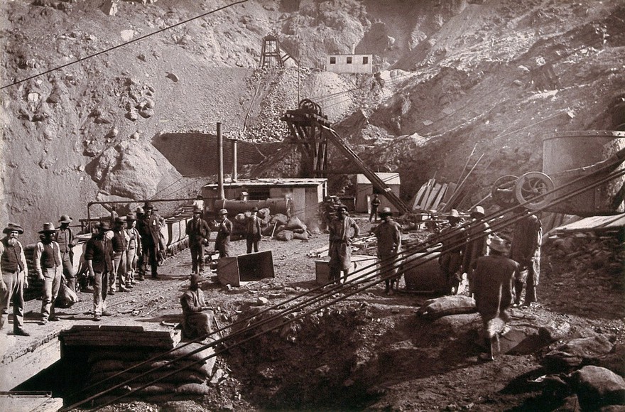 Kimberley, South Africa: miners around the Central Company's shaft in the Kimberley mine. Woodburytype, 1888, after a photograph by Robert Harris.