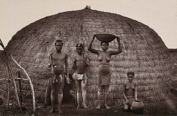 South Africa: a Zulu family and kraal. Woodburytype, 1888, after a photograph by Robert Harris.
