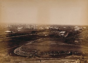 view Johannesburg, South Africa: panoramic view towards the city from Doornfontein. Photograph by Robert Harris, 1889.