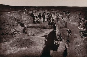 view South Africa: Grahamstown Gold Mining Company miners at work. Woodburytype, 1888, after a photograph by Robert Harris.