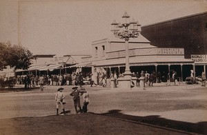 view South Africa: people in the market place at Durban. 1896.