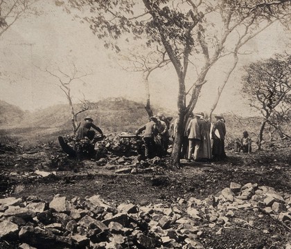 Zimbabwe: members of the British Association viewing ancient ruins at Umtali. Photograph by Sir William Crookes, 1905.