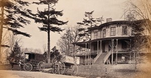 view Fairmont Park, Philadelphia, Pennsylvania: horse and carts outside a building with a verandah. Photograph by Francis Frith, ca. 1880.