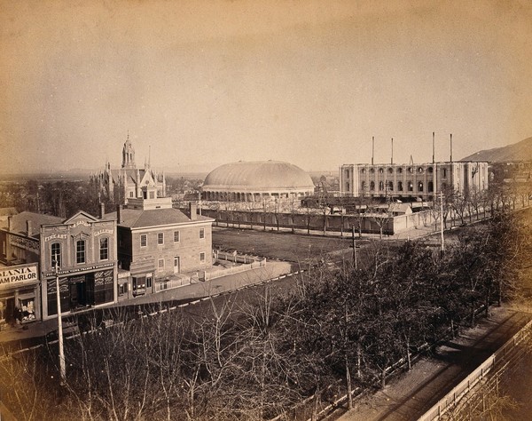 Temple Block, Salt Lake City, Utah: showing the Tabernacle, the Assembly Hall, and the Salt Lake Temple under construction. Photograph, ca. 1880.