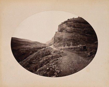 A Central Pacific railway track running through an area called Red Rock (Nevada?). Photograph, ca. 1880.