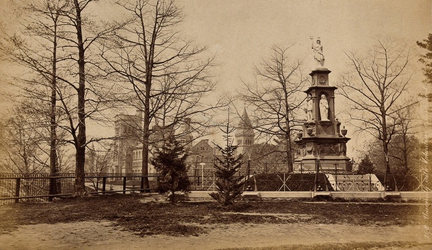 The Volunteers' Monument, University of Toronto, Canada: university buildings in the background. Photograph, ca. 1880, of a sculpture (by C. E. Zollicoffer?), 18--.