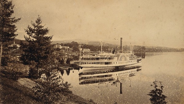 Lake George, New York: the Horicon paddle-steamer showing a clear reflection in the water. Photograph, ca. 1880.