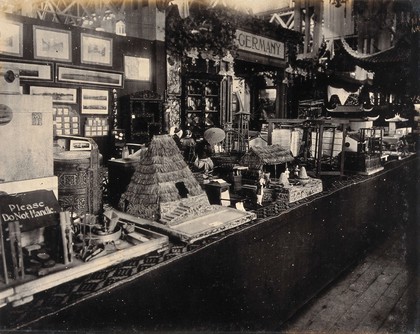 The 1904 World's Fair, St. Louis, Missouri: Chinese exhibits: small models of traditional Chinese dwellings. Photograph, 1904.