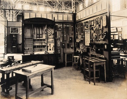 The 1904 World's Fair, St. Louis, Missouri: a Swedish exhibit showing a 'sloyd' (wood craftwork) workroom and tools. Photograph, 1904.