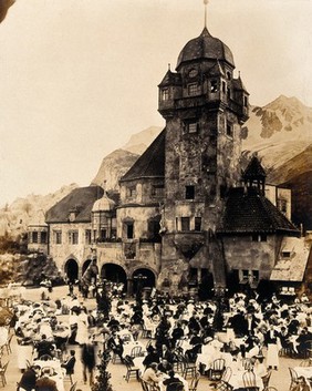 The 1904 World's Fair, St. Louis, Missouri: the Tyrolean Alps restaurant: diners seated outside. Photograph, 1904.