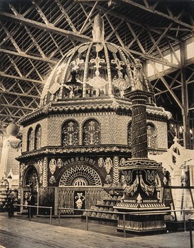 The 1904 World's Fair, St. Louis, Missouri: a Missouri exhibit of a dome partly constructed from ears of corn. Photograph, 1904.