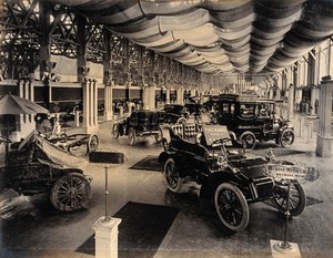 view The 1904 World's Fair, St. Louis, Missouri: an automobile exhibit displaying Packard motorcars. Photograph, 1904.