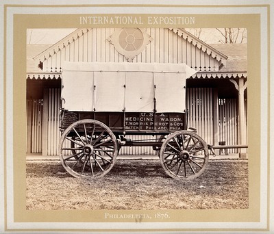 Philadelphia International Exposition, 1876: American Civil War medicine wagon produced by T. Morris Perot and Company: side view. Photograph, 1876.