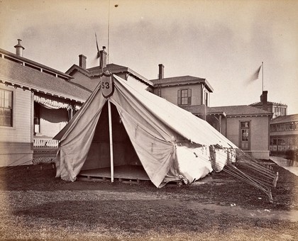 Philadelphia International Exposition, 1876: Hospital of the Medical Department of the U.S. Army: rear view showing a hospital tent. Photograph, 1876.