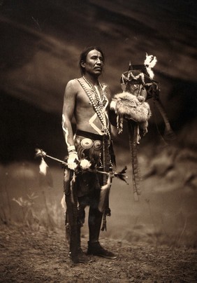 A Navajo man in ceremonial dress representing the Yebichai god Zahabolzi (Zahadolzha?). Photograph by Edward S. Curtis, 1904.