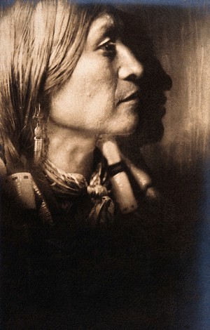 view A Jicarilla Indian Chief, in ceremonial dress, North America. Photograph by Edward S. Curtis, 1904.