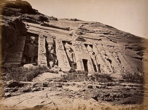 view The Abou Simbel small temple (Nefertari's temple of Hathor), Nubia, Egypt: six standing colossi. Photograph by Pascal Sébah, ca. 1875.