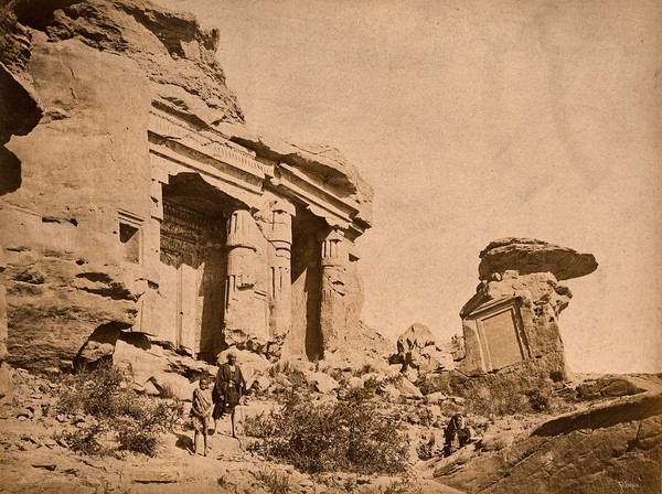 Gébel Silsileh, Egypt: shrines in ruins; local people in the foreground. Photograph by Pascal Sébah, ca. 1875.