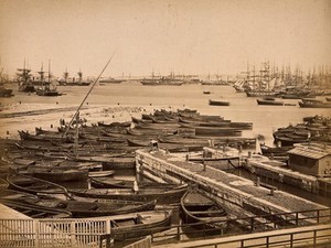 view Greece or Turkey (?): rowing boats and ships in a harbour. Photograph (by Pascal Sébah ?), ca. 1870.