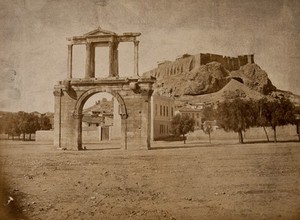 view The Arch of Hadrian, Athens, Greece; the Acropolis in the background. Photograph (by Petros Moraites ?), ca. 1870.